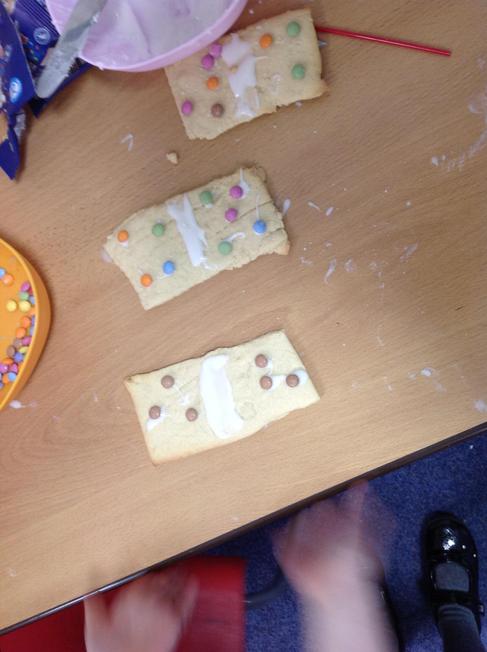 We baked biscuits and used our subitising knowledge to make them into dominoes.